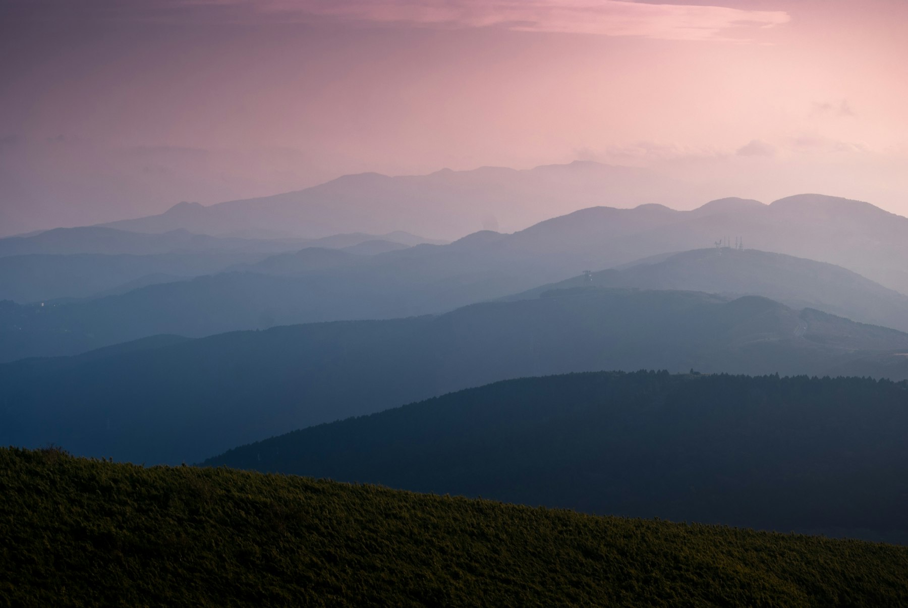 Layered ridgelines in a real valley at golden hour