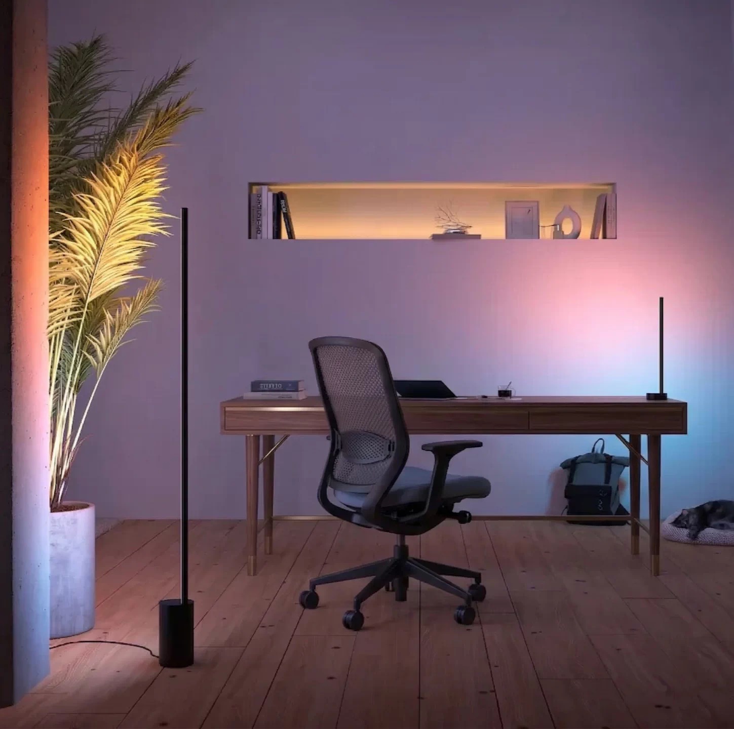 A desk with table and floor lamps creating warm and cool accents