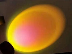 Warm sunset projection effect from JINK Glide Air Sunset